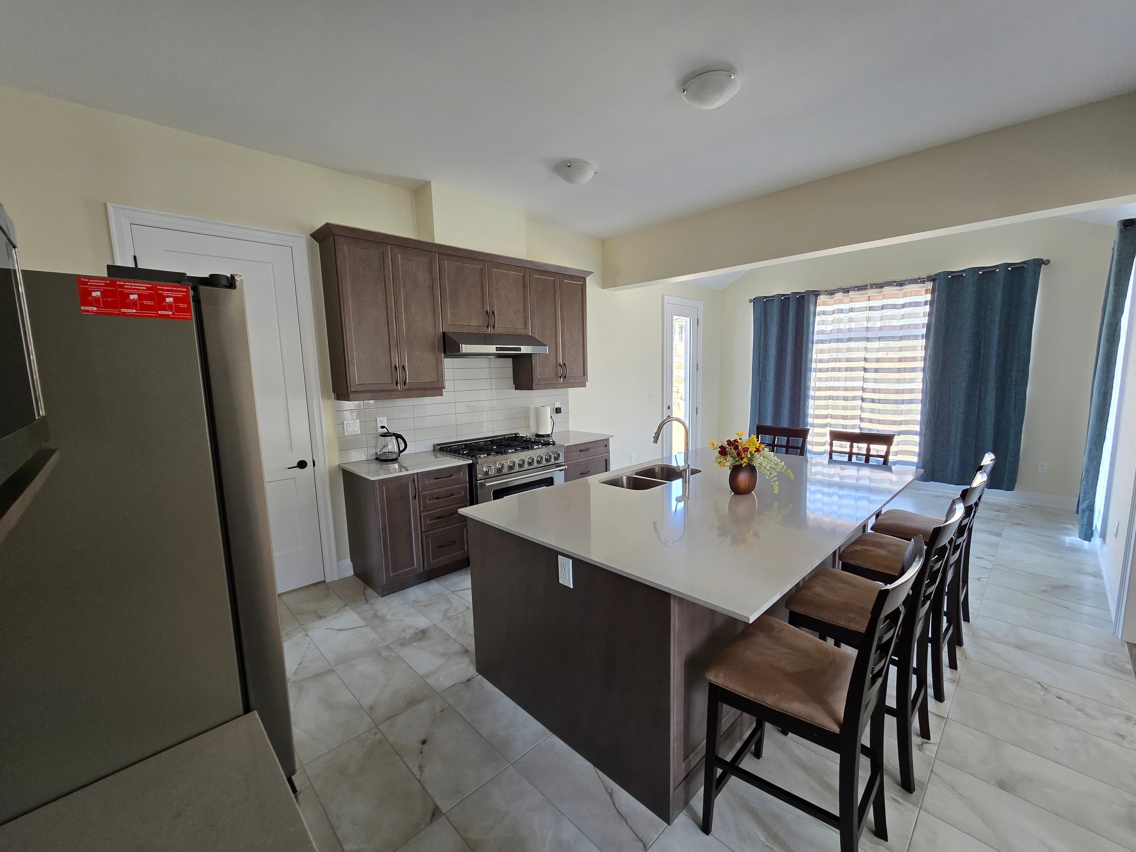 Chef's kitchen with island seating